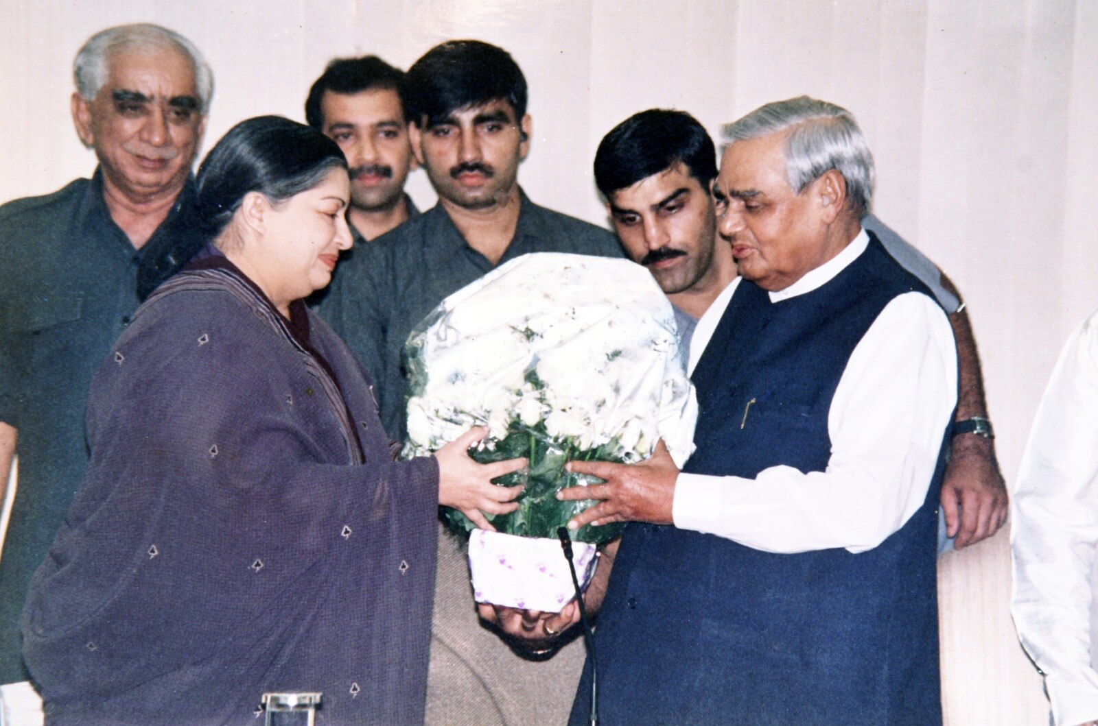 Jayalalitha greets Atal Bihari Vajpayee with a bouquet of flowers in New Delhi.