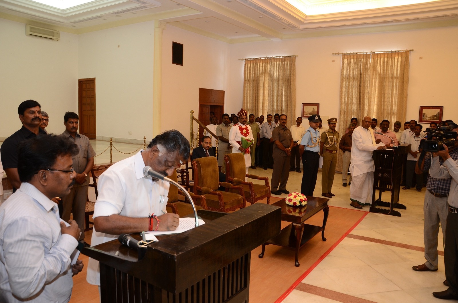 O. Panneerselvam gets emotional while taking oath as Tamil Nadu Chief Minister in the absence of Jayalalithaa at the Raj Bhavan in Chennai (India Today)
