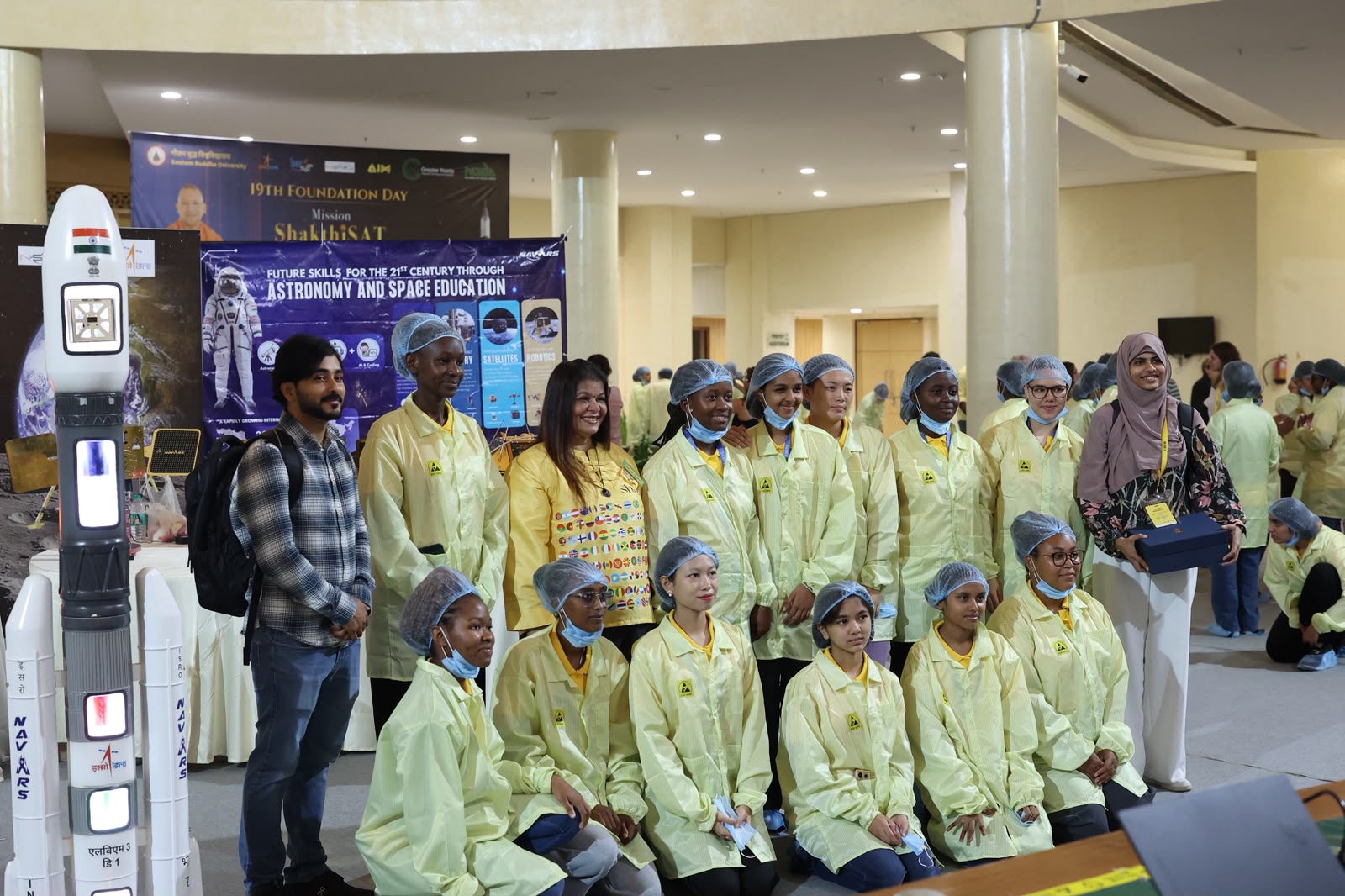 Girls who are part of Mission ShakthiSat pose with officials for a photo. (Photo: Space Kids India)