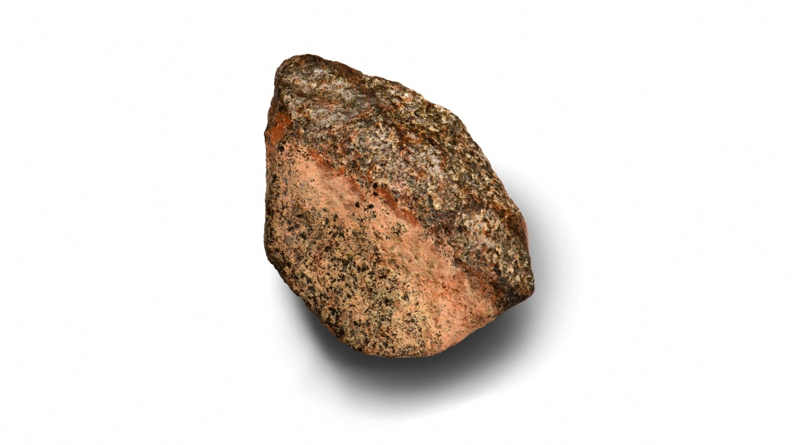 Teghaza 001, a rose-colored rock that is among the oldest Martian meteorites ever found on Earth. (Photo: Reuters)