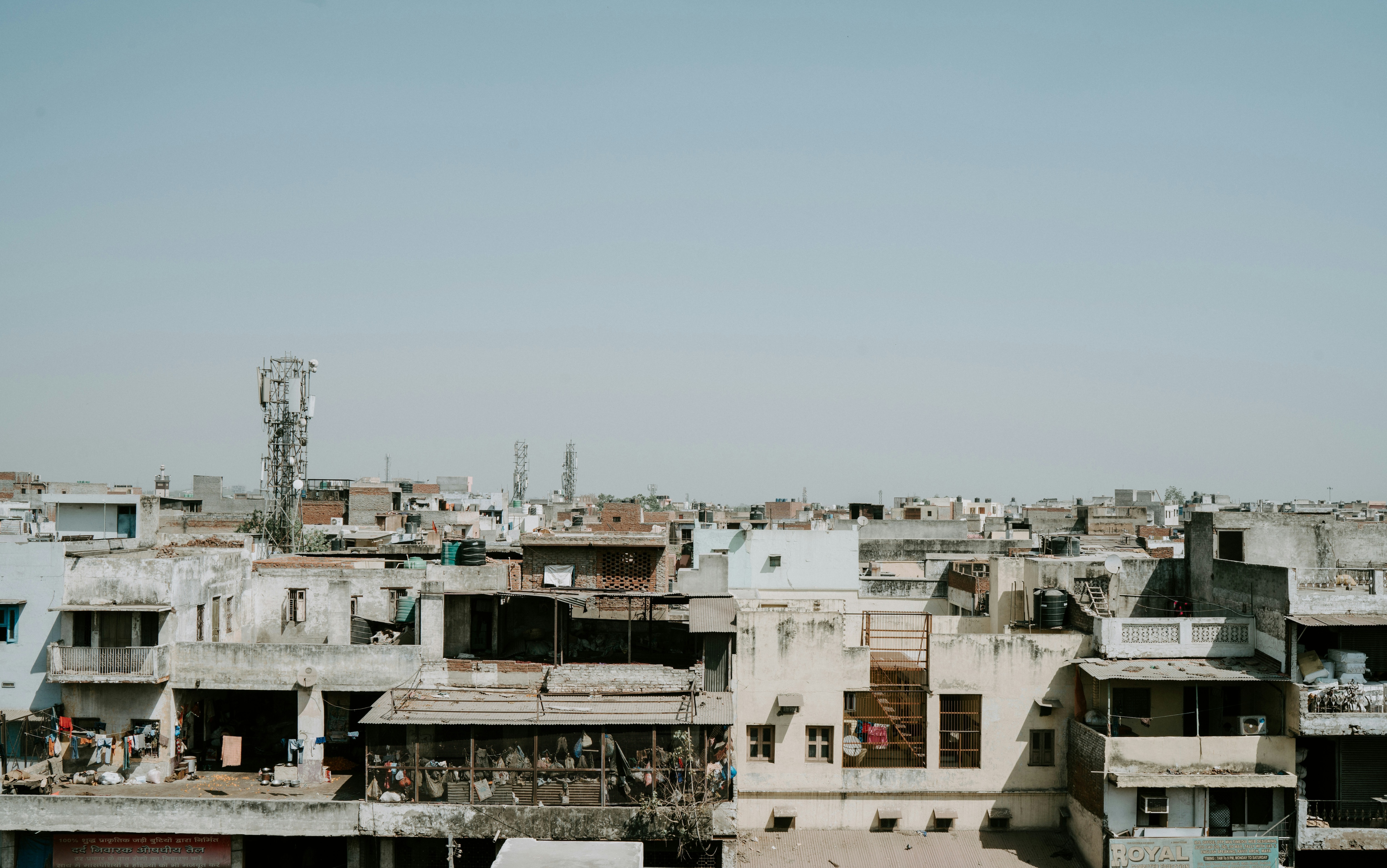 A row of concrete homes are seen in Old Delhi. (Photo: Unsplash)