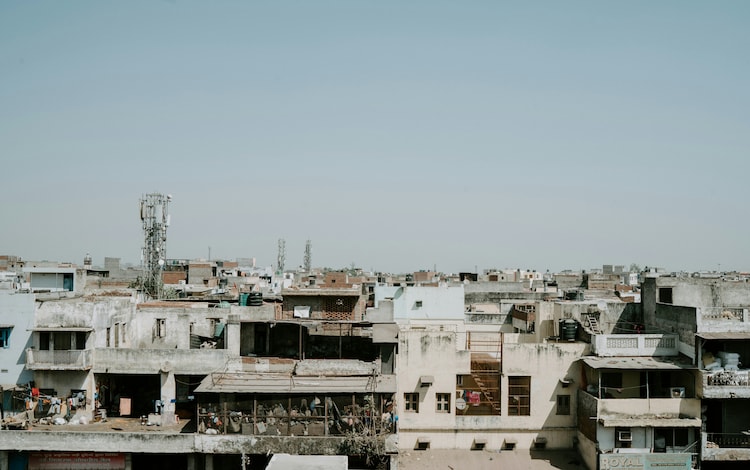 A row of concrete homes are seen in Old Delhi. (Photo: Unsplash)
