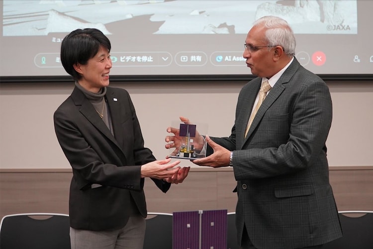 Jaxa's Department Head Matsuura presents a rover model to Isro's Jayashimha at an earlier meeting. (Photo: JAXA)