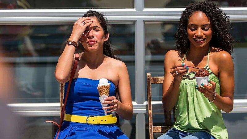 Women walk while eating ice cream on a hot day. (Representational Photo: Getty)