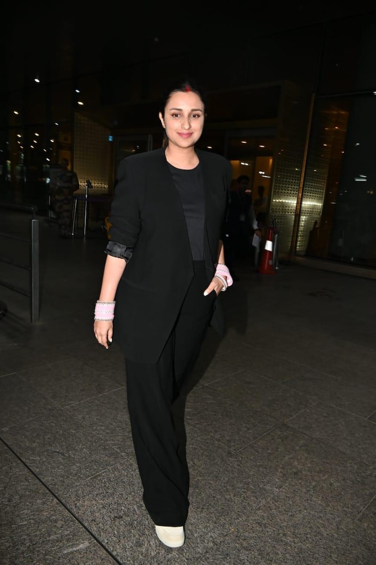 New bride Parineeti Chopra in black pantsuit and pink chooda