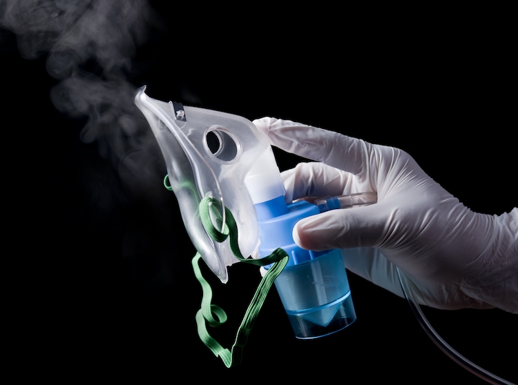 A nebulizer is a medical device that turns liquid medication into a fine mist or droplets, making it easier to breathe in. (Photo: Getty Images)