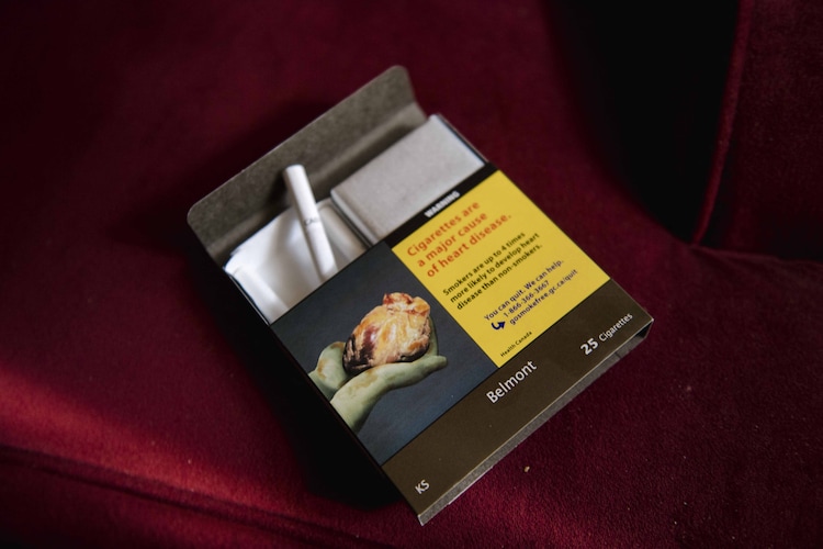 coughing cigarette pack, cigarette packet that coughed, anti smoking innovation, Lewis R Toppel, 1972 invention, anti-smoking tools, tobacco deterrents, India cigarette warnings, US cigarette warnings, health packaging laws, novelty inventions, cigarette pack patent