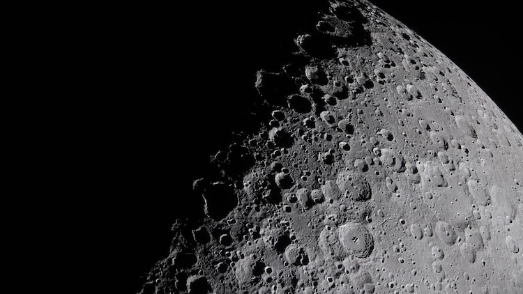 The lunar terminator, the sharp boundary between day and night, casts long shadows over Birkhoff crater to reveal its deep ridges. (Photo: Nasa)