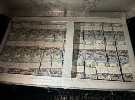 The US Attorney&acirc;€™s office posted a picture of cash alongside the arrest announcement.