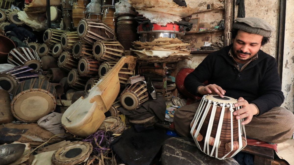 The syahi, iron oxide paste applied in graduated layers, transforms chaotic drum vibrations into organised musical harmony through precise weight distribution. (Photo: Reuters)