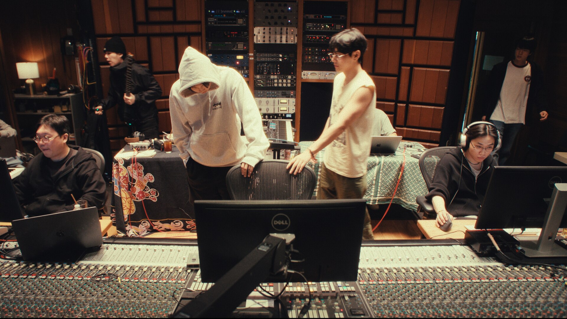 In pic: BTS members with producer Pdogg as they work on ARIRANG. Credits: Netflix 