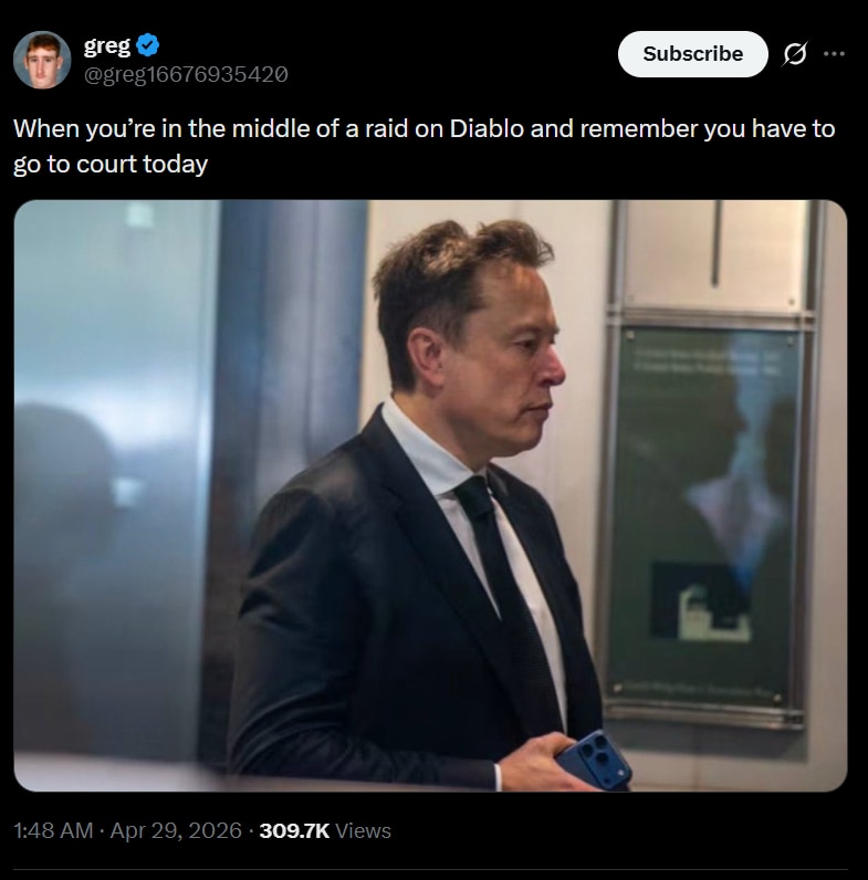 Elon Musk using iPhone
