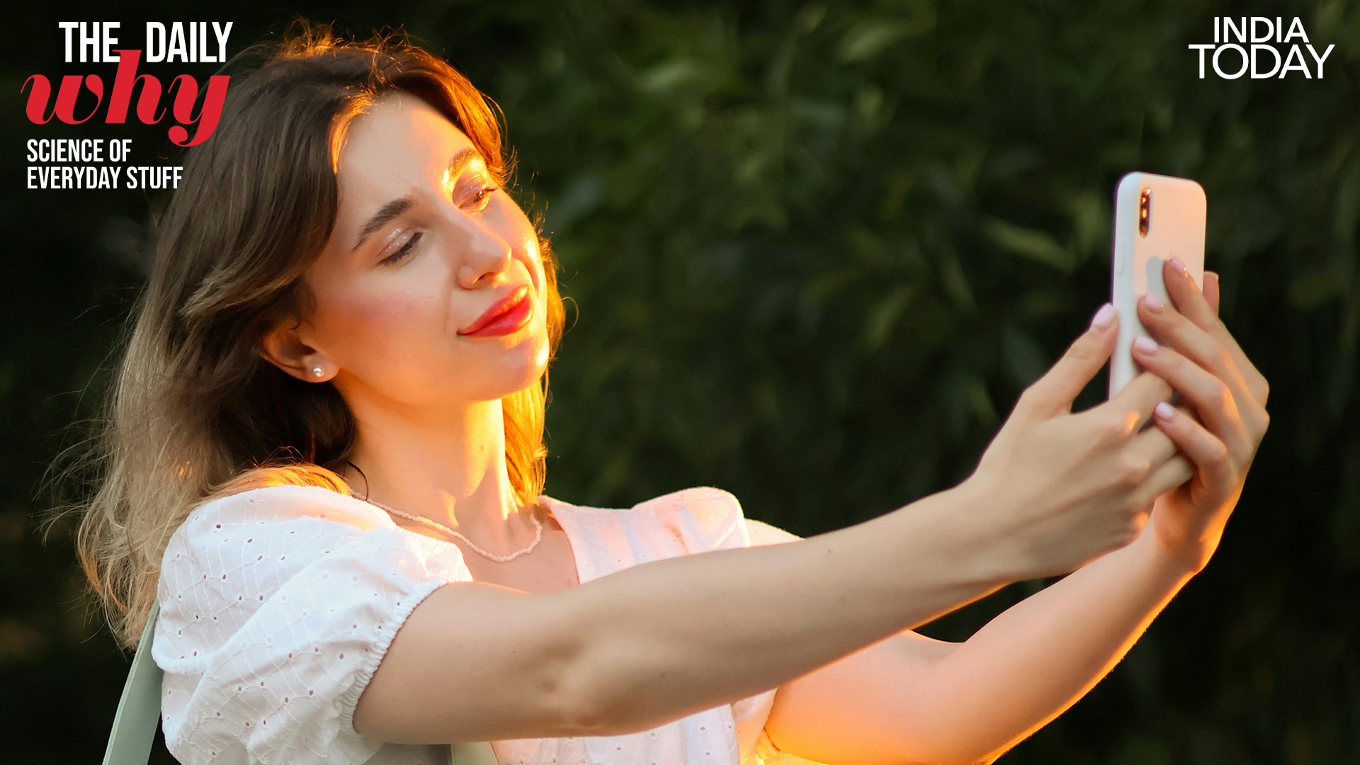 A person capturing a selfie on the front camera of a smartphone. Phone makers deliberately mirror the preview so you can pose comfortably, just like looking into a bathroom mirror. (Photo: Reuters)