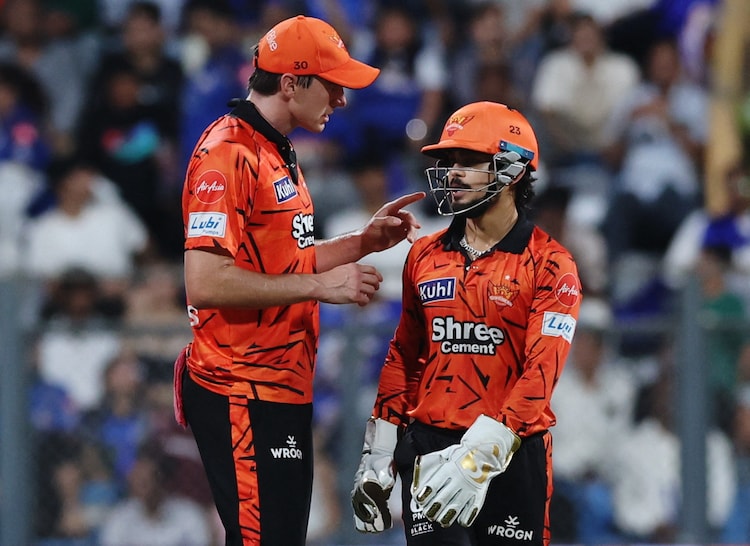 Pat Cummins alongside Ishan Kishan for Sunrisers Hyderabad. Image: Reuters