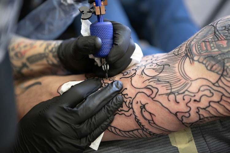 When a tattoo needle drives ink into the dermis, the second layer of skin, the bodyâs immune cells rush to the site. (Photo: Unsplash)
