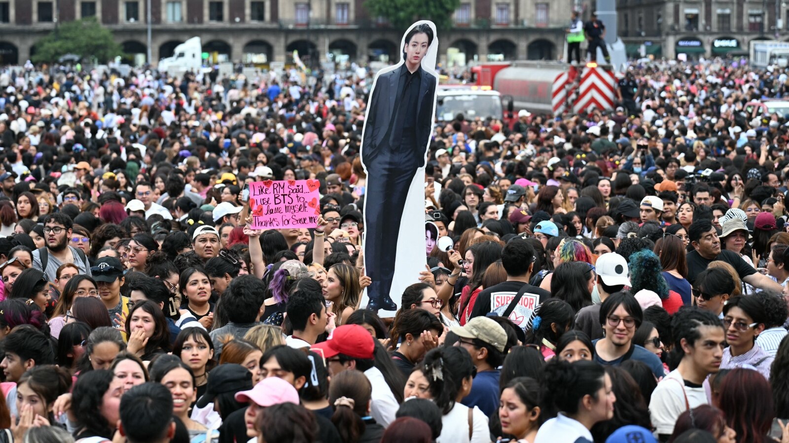 Fans of South Korean K-pop band BTS gather outside the National Palace waiting for the band members to appear on the balcony, at Zocalo square in Mexico City on May 6, 2026.