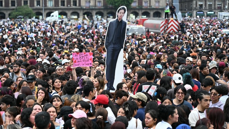 Fans of South Korean K-pop band BTS gather outside the National Palace waiting for the band members to appear on the balcony, at Zocalo square in Mexico City on May 6, 2026.