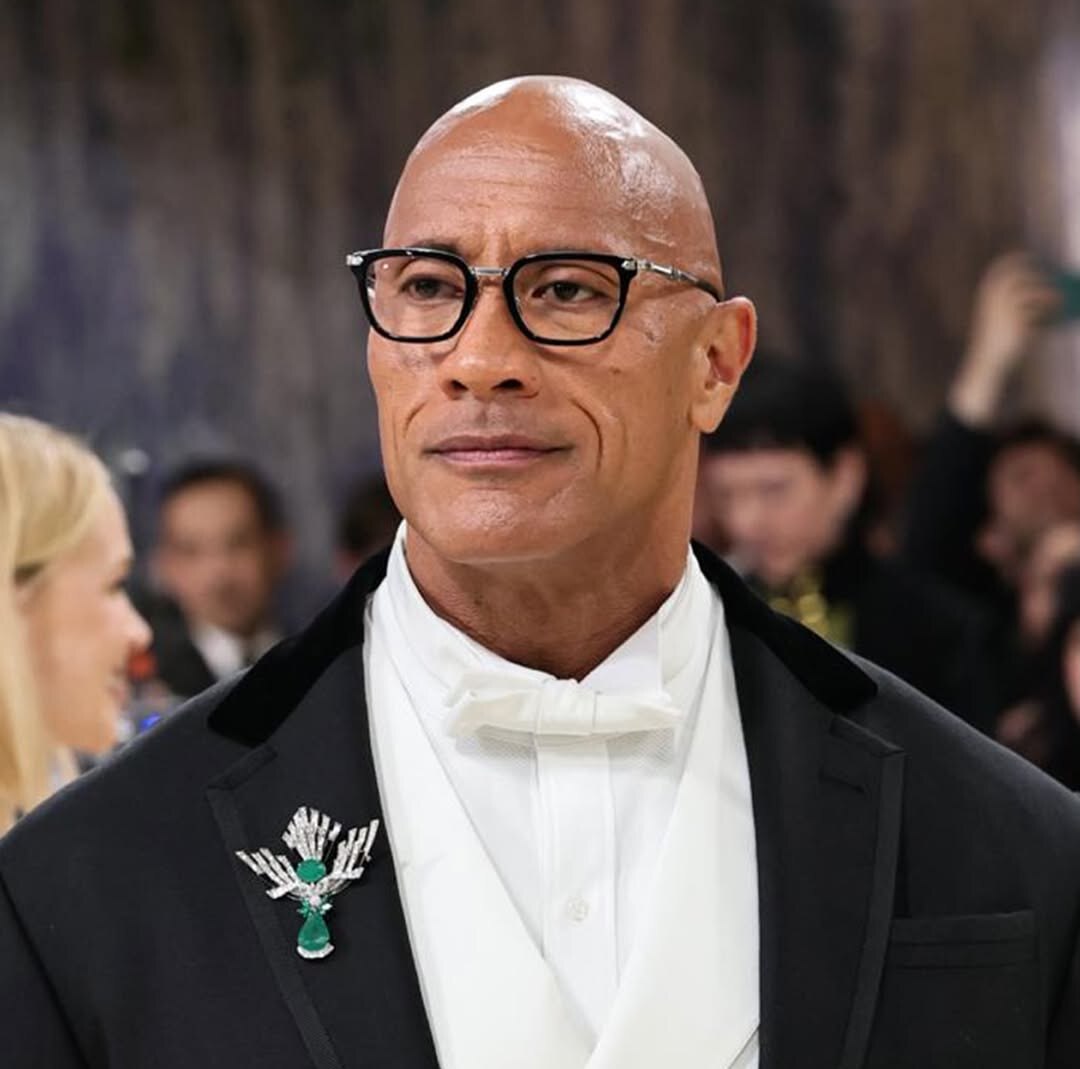 Dwayne Johnson styles MM's signature brooch | Photo: Instagram