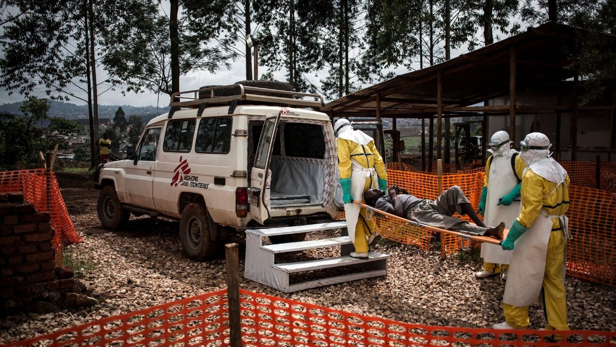 Health workers move a patient to a hospital after he was cleared of having Ebola in Butembo, Democratic Republic of the Congo. (Photo: AFP)