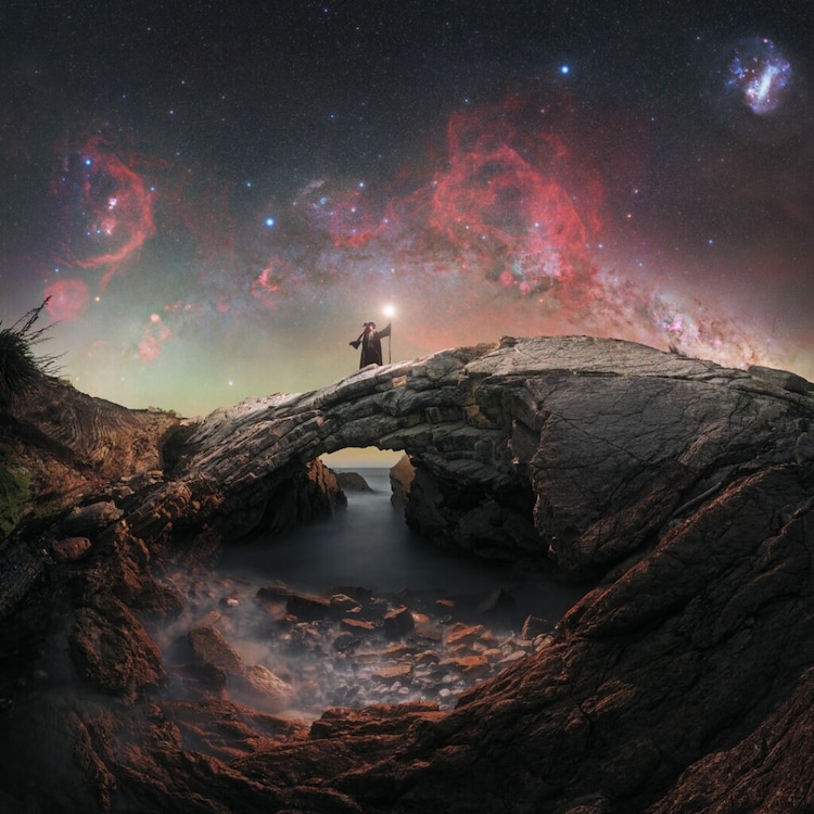 The southern Milky Way rises above the dramatic rock formations of the Wairarapa Coast in New Zealand. A seal, which had refused to leave its favourite resting spot on the rocks, can be spotted in the lower foreground of this panorama by Evan McKay. (Photo credit: Evan McKay/Capture the Atlas)