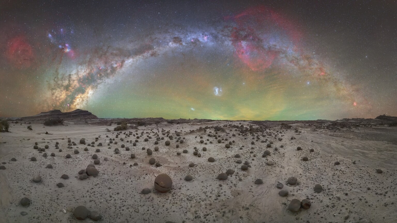 The first ever full Milky Way arch photographed above Ischigualasto Provincial Park in Argentina, also known as Valle de la Luna. The UNESCO World Heritage site preserves fossils of some of the earliest known dinosaurs, and every step on its terrain required extreme care. (Photo credit: Gonzalo Javier Santile/Capture the Atlas)