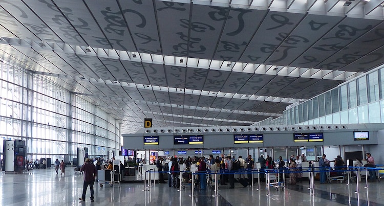Various Bangla alphabets are artistically illustrated across the ceiling of the new terminal of Kolkata's Netaji Subhas Chandra Bose International Airport. (Image: Paul Hamilton/ Wiki)