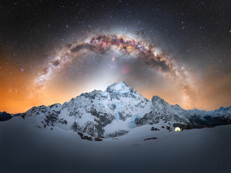 The Milky Way arches above Aoraki/Mount Cook, New Zealand's highest peak, after photographer Owain Scullion navigated steep snow and rocky terrain in winter conditions to reach this remote vantage point. (Photo credit: Owain Scullion/Capture the Atlas)