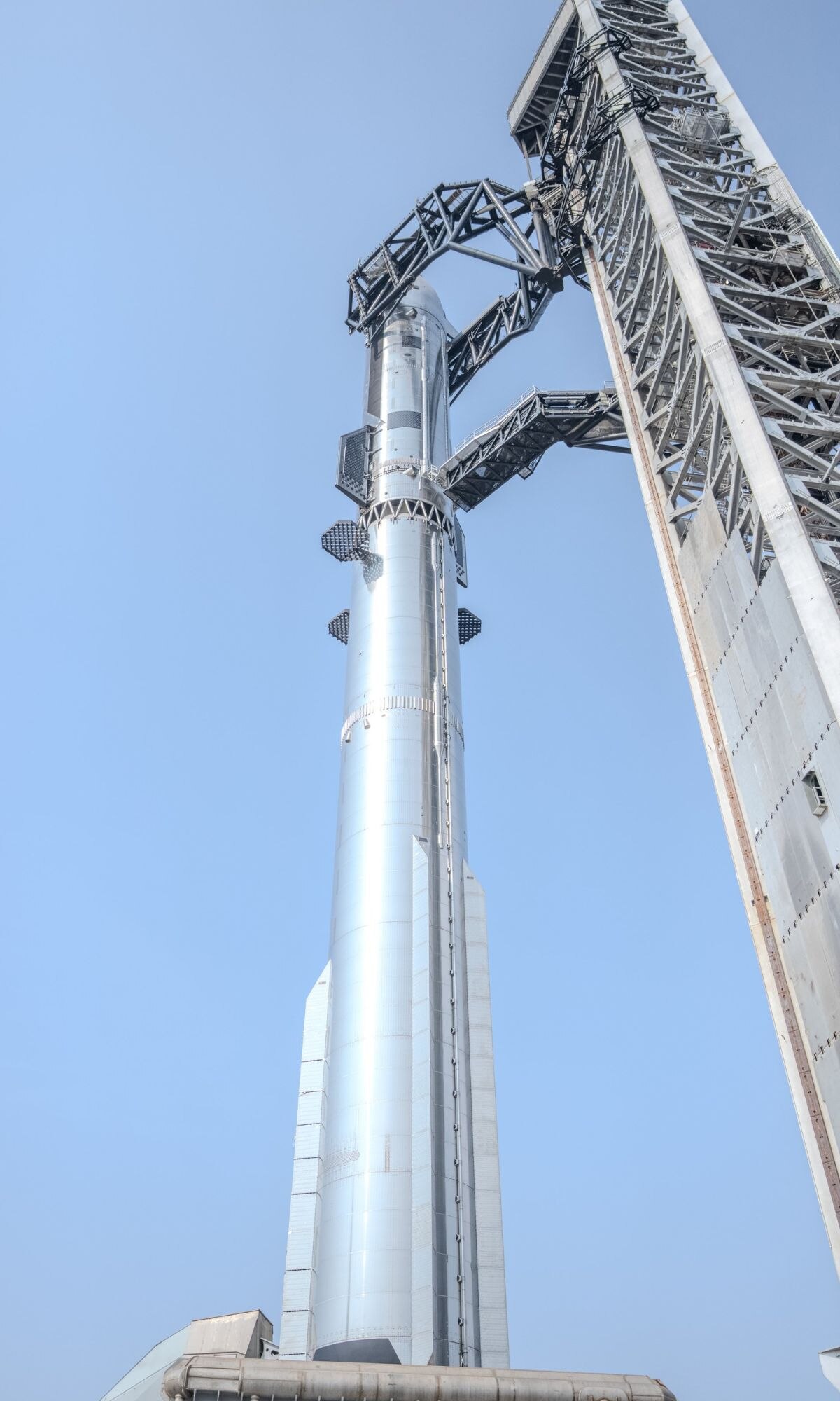 SpaceX just stacked the world's tallest rocket for the first time. At 124 metres, Starship V3 is now ready for its debut orbital launch. Here is what makes this version a giant leap forward. (Photo: SpaceX)