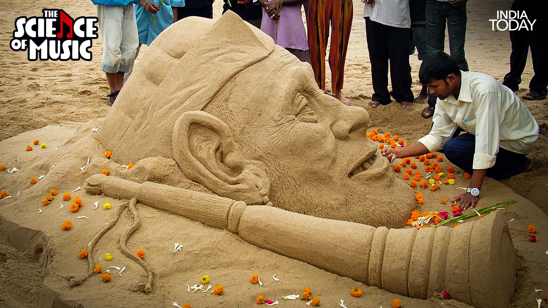 A sand sculpture of Ustad Bismillah Khan with his shehnai, garlanded with marigolds. The maestro received the Bharat Ratna in 2001 and was buried at Fatemaan burial ground in old Varanasi with a shehnai placed beside him in the grave, accompanied by a 21-gun salute from the Indian Army. (Photo: Reuters) 