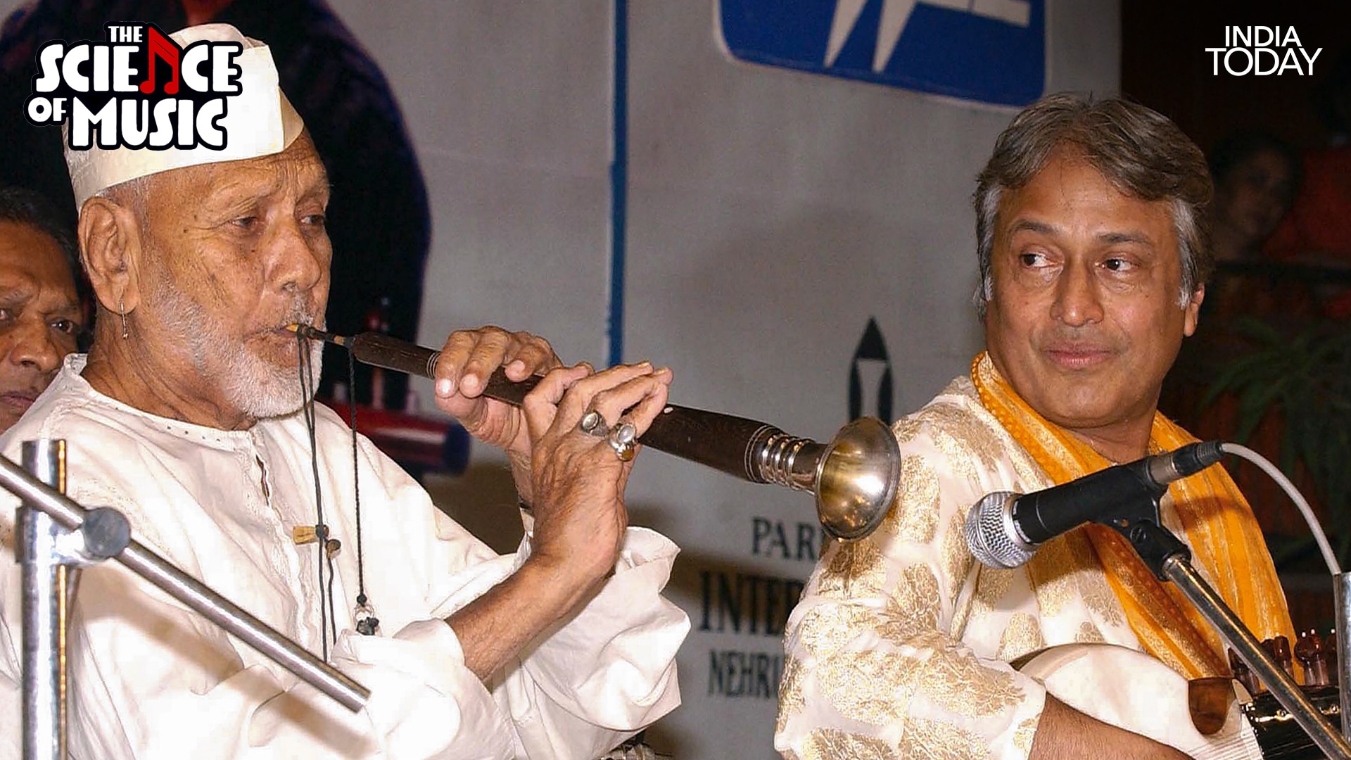 Shehnai maestro Ustad Bismillah Khan performs as sarod player Ustad Amjad Ali Khan looks on during their jugalbandi in Delhi on August 18, 2003. (Photo: PTI)