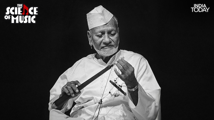 Ustad Bismillah Khan with the shehnai, eyes closed, lost in a moment of music. The flared metal bell at the end of the instrument is not decorative; it performs the same acoustic function as a megaphone for a human voice, allowing more of the sound to leave the instrument and travel outward into the world. (Photo: PTI)