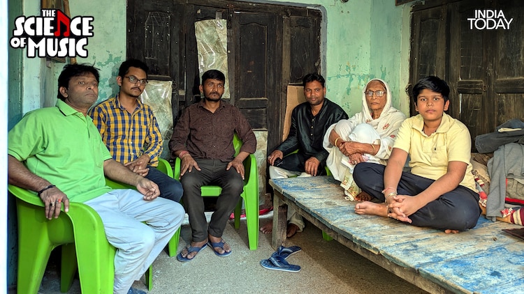Members of Ustad Bismillah Khan's family at the family home in Varanasi. His grandsons, including Haidar, continue to perform the shehnai at cultural programmes, including at the reception held in Varanasi for French President Emmanuel Macron in 2018. (Photo: PTI)