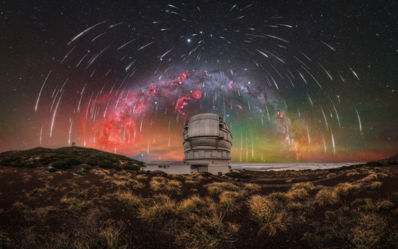 Geminid meteors rain down above the Gran Telescopio Canarias, the world's largest optical telescope, on the summit of La Palma in the Canary Islands. Photographer Uros Fink built this 400-megapixel composite from six cameras over five storm-interrupted nights. (Photo credit: Uros Fink/Capture the Atlas) 
