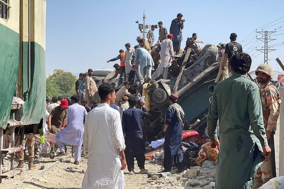 People gather as they search for survivors after a blast near a railway track. (Image: Reuters)