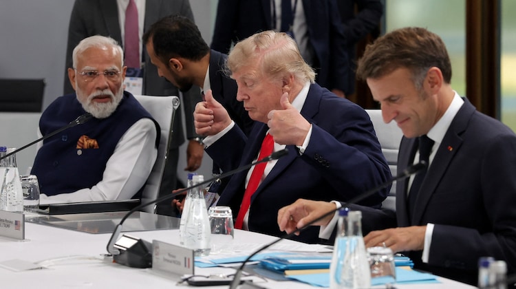 Prime Minister Narendra Modi, French President Emmanuel Macron and US President Donald Trump attend a meeting during the G7 summit.