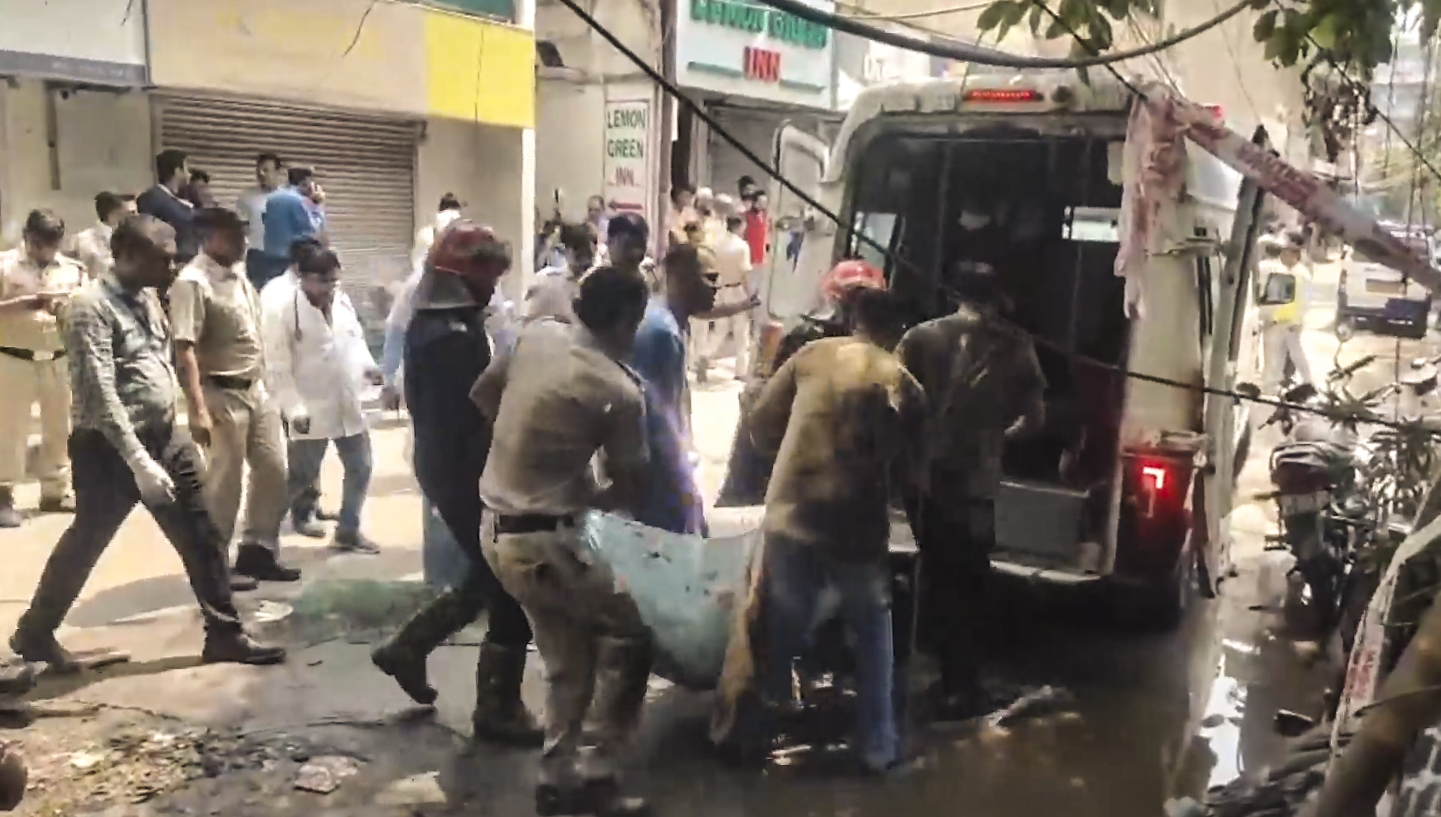 Police, firefighters and health officials at the site after a fire broke out in a restaurant in south Delhi's Malviya Nagar. (Photo: PTI)