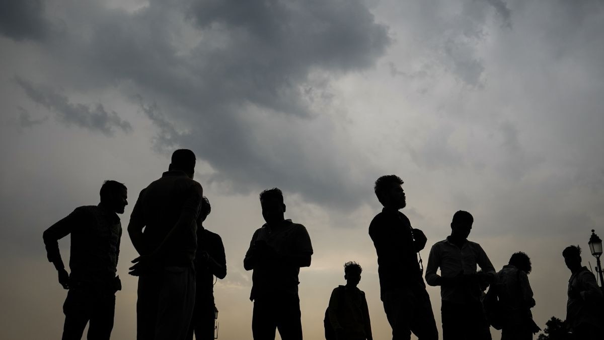 Heavy rain clouds loom over the New Delhi skyline as the monsoon moves northward. (Photo: PTI)