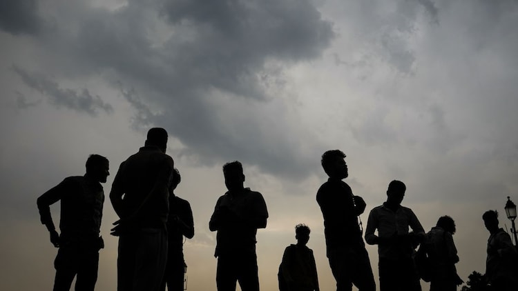 Heavy rain clouds loom over the New Delhi skyline as the monsoon moves northward. (Photo: PTI)