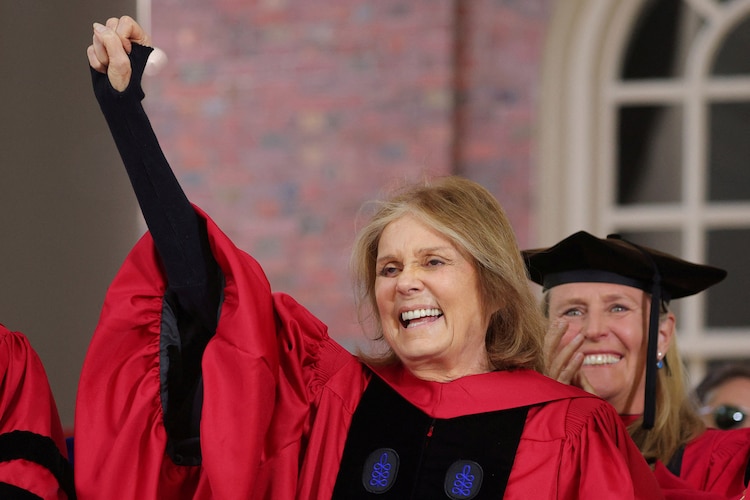 Steinem salutes the graduating students as she receives an honorary Doctor of Humane Letters during Harvard University's 371st Commencement