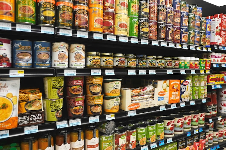 Wall to wall, brightly lit and legally compliant: the modern snack aisle passes every food-safety test our law was built to run. (Photo: Unsplash)