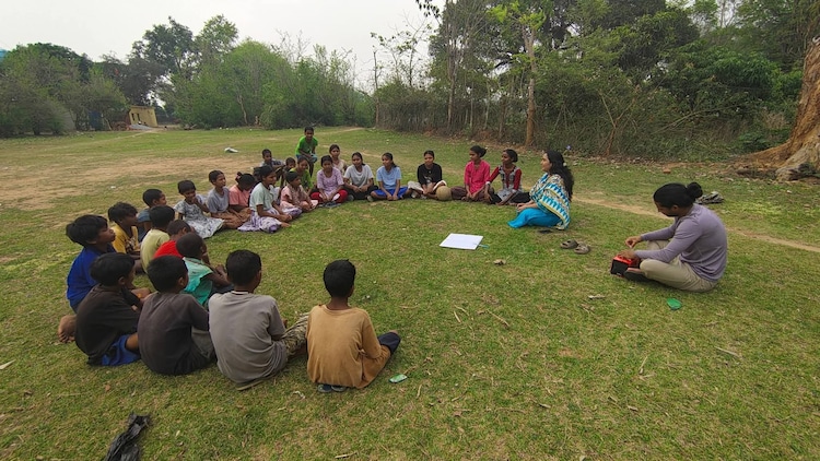 Monika Arya conducts a learning session with children in a tribal village in Jharkhand.