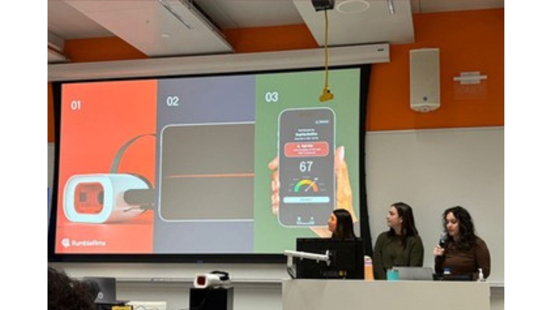 The Rumble Rims team demonstrates the headset and its screening interface. (Image: jamesdysonaward.org)