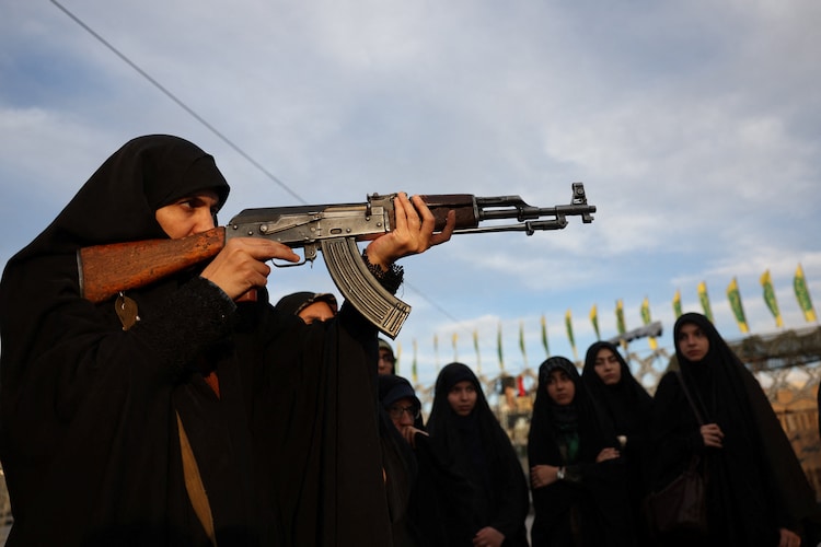 Iranian women begin military training, prepare for possible US-Israel ground attack 2 2026 10 04t173352z 1996444406 rc2dwnaegnz2 rtrmadp 3 iran crisis