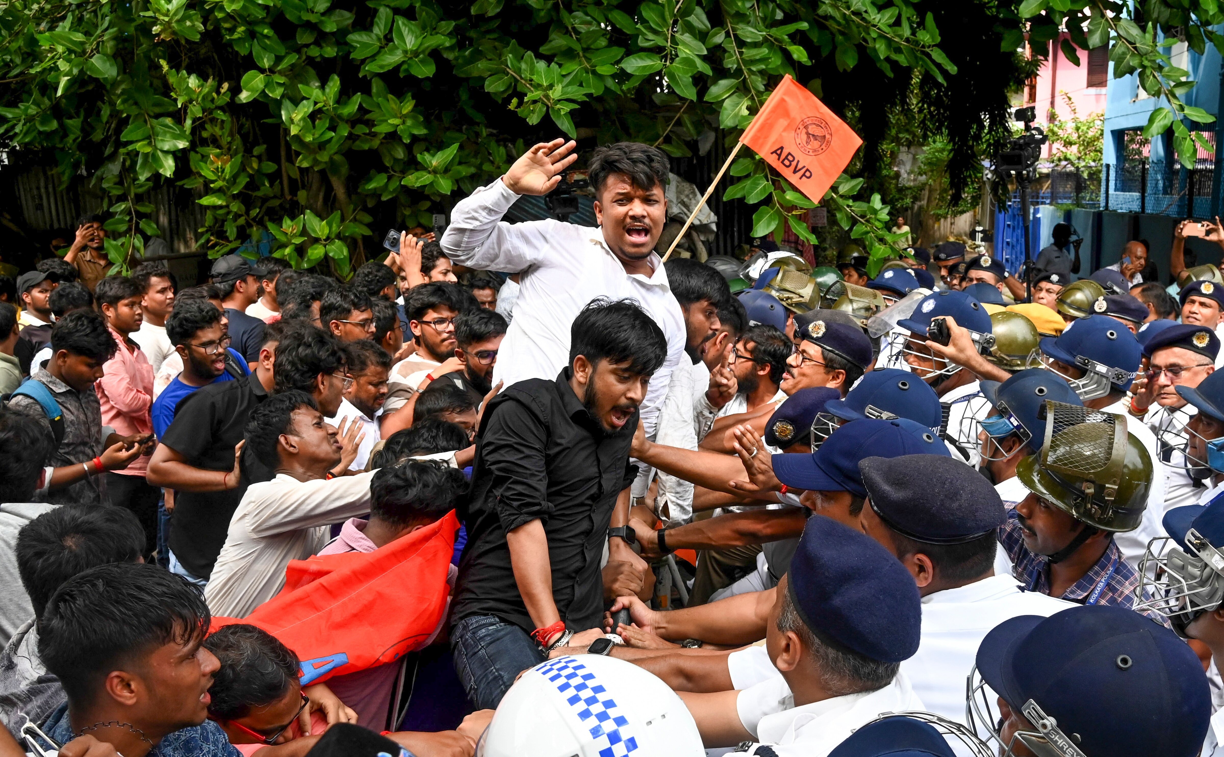 Kolkata Police stop ABVP members marching towards Jadavpur University after clashes erupted on the campus the previous night, on August 20. (Image: PTI)  