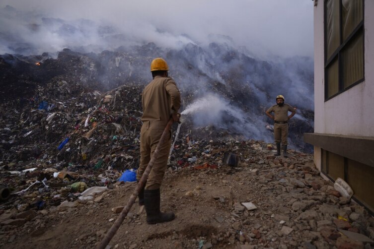 Locals choke as Delhi's Bhalswa landfill site burns again Pics