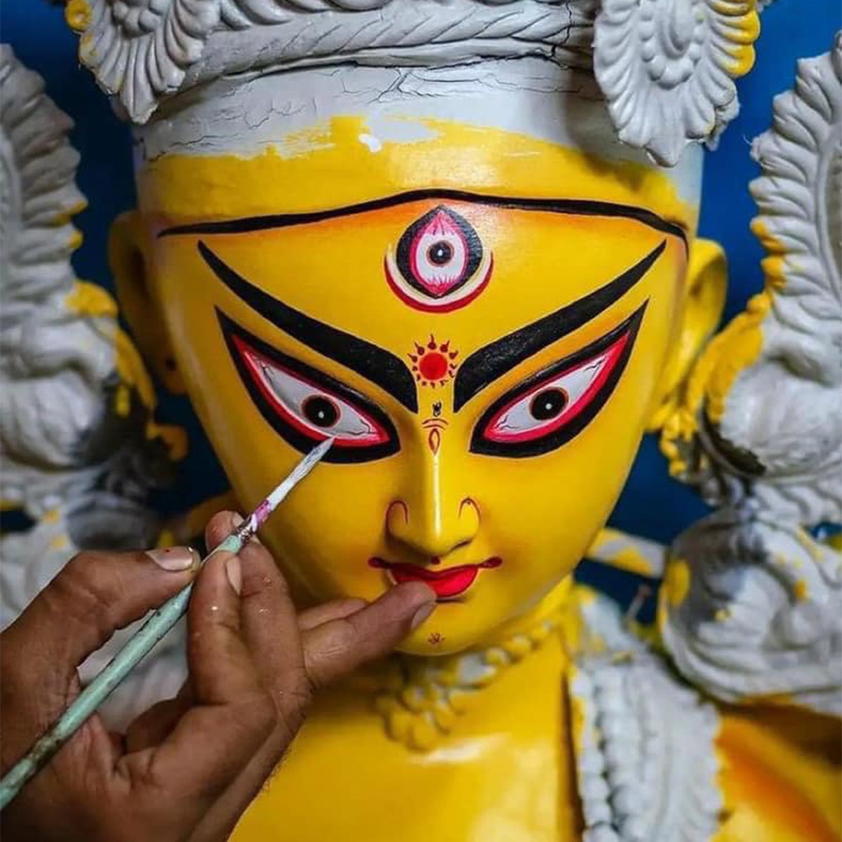 durga eyes painting ritual