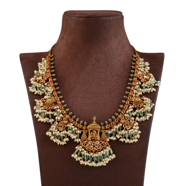 https://akm-img-a-in.tosshub.com/lingo/brt/images/photo_gallery/202508/krishna_jewellers_22k_gold_long_haram_with_guttapusalu_rs_1617275.jpg