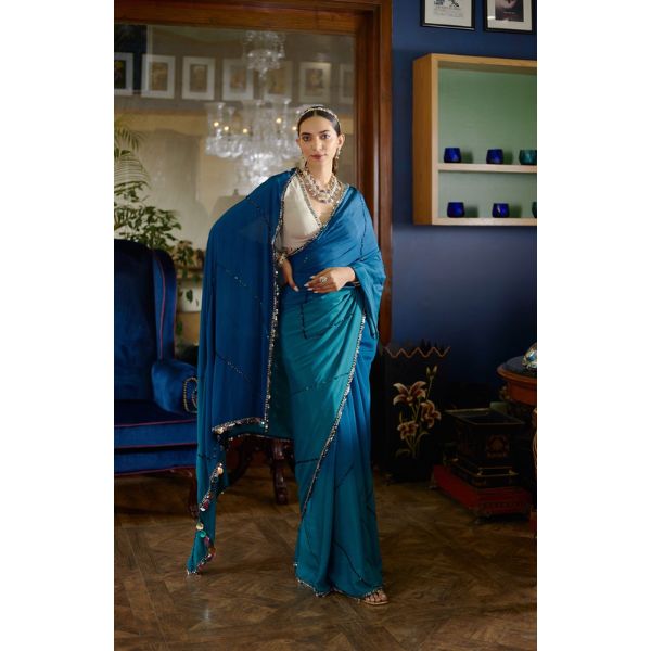 https://akm-img-a-in.tosshub.com/lingo/brt/images/photo_gallery/202508/shasha_gaba_morni_saree_morni_regular_pricers_45000.jpg