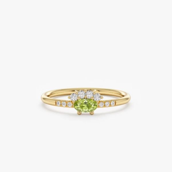 https://akm-img-a-in.tosshub.com/lingo/brt/images/photo_gallery/202508/the_karat_stone_14k_solid_gold_peridot_diamond_crown_ring_rs_52503.jpg