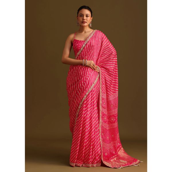 https://akm-img-a-in.tosshub.com/lingo/brt/images/photo_gallery/202509/kalki_fashion_hot_pink_lehariya_saree_in_gota_patti_work_with_unstitched_blouse_rs9995.jpg